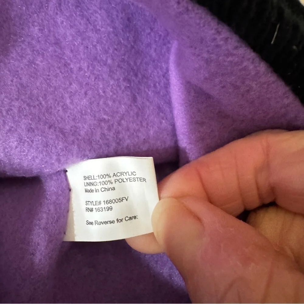 Penguin snow hat, black with white & purple, tassles, purple lining, stretchy.